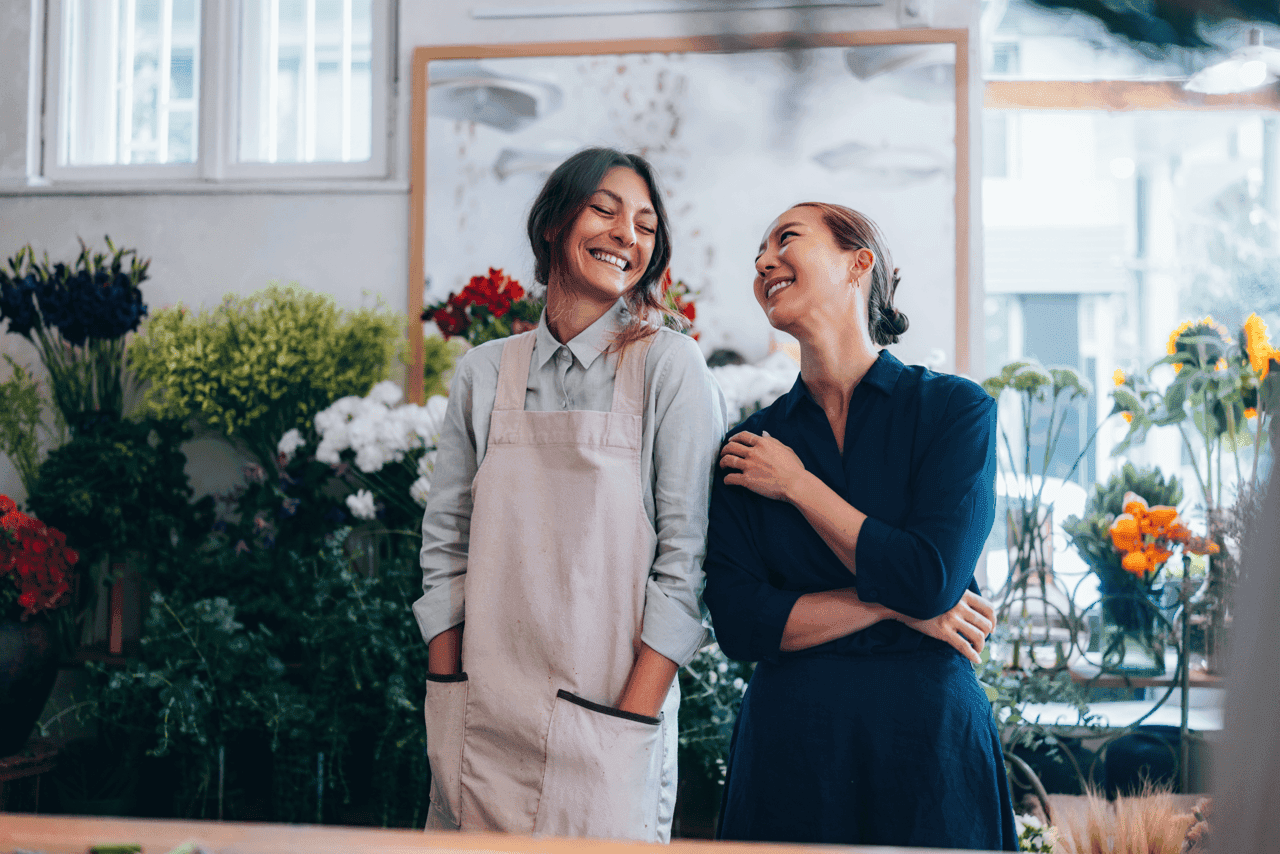 A team helping a small business owner